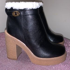 GUESS Women's Peggey Heeled Fashion Boots‎